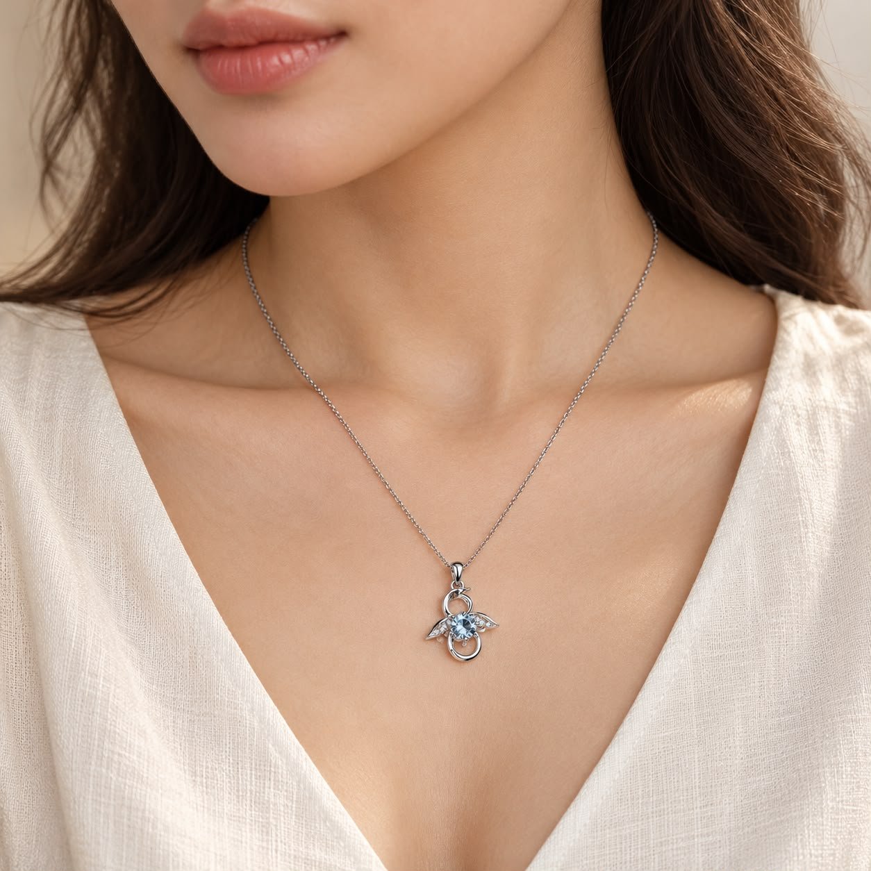 Aquamarine angel silver pendant